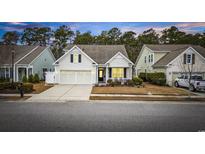Beautiful 3-car garage home with front porch at 1401 Suncrest Dr., Myrtle Beach, SC 29579