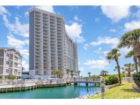 Oceanfront high-rise building with resort amenities and a picturesque waterway at 161 Seawatch Dr. # 1108, Myrtle Beach, SC 29572