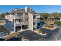 Two-story condo building with parking and ocean views at 1801 N Ocean Blvd. # K1, North Myrtle Beach, SC 29582