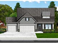 Charming single-Gathering home showcasing a three-car garage and beautifully landscaped yard with mature trees at 4730 Huckleberry Ln., Conway, SC 29526