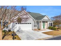 Gray two-story house with green door and attached garage at 503 Waltham Forest Dr. # 1004, Murrells Inlet, SC 29576