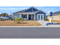 Dream Finders Home's exterior features gray and blue siding at 109 Foxford Dr., Conway, SC 29526