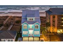 Oceanfront home with private pool, deck, and parking at 1303 S Ocean Blvd., North Myrtle Beach, SC 29582