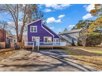 Purple house with deck and fenced yard at 1553 Landing Rd., Myrtle Beach, SC 29577