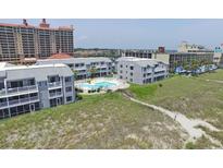 Aerial view of coastal condo complex with pool and beach access at 1820 N Ocean Blvd. # 102D, North Myrtle Beach, SC 29582