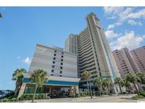 Oceanfront high-rise building with palm trees and balconies at 2504 N Ocean Blvd. # 1733, Myrtle Beach, SC 29577