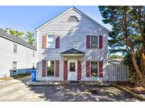 Two-story house with red shutters and a small front yard at 619 37Th Ave. N # 4, Myrtle Beach, SC 29577