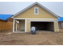 A new construction home features a spacious two-car garage with a neutral exterior at 1252 Lady Bird Way, North Myrtle Beach, SC 29582