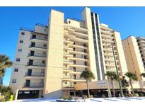 Oceanfront building, featuring multiple balconies and palm trees at 1690 North Waccamaw Dr. # 807, Garden City Beach, SC 29576