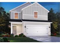 Two-story house with gray siding, white trim, and a two-car garage at 3070 Dover Branch Dr., Little River, SC 29566