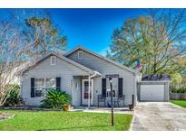 Charming one-story house with a well-maintained lawn and driveway at 9431 Leeds Circle, Myrtle Beach, SC 29588