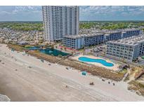 Aerial view of coastal community, pool, and beach access at 5905 S Kings Hwy. # 514-B, Myrtle Beach, SC 29575