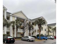 Inviting condominium complex with well-maintained landscaping and ample parking spaces at 601 N Hillside Dr. # 4235, North Myrtle Beach, SC 29582