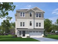 Charming three-story home featuring a two-car garage, gray siding, and a welcoming front entrance at 301 Crossing Ct., Myrtle Beach, SC 29588