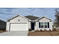 Charming one-story home showcasing a white garage door, blue shutters, and light gray vinyl siding at 6000 Fuller Ridge Ct, Conway, SC 29526