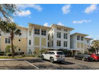 Luxury condo building with inviting architecture and ample parking at 1313 Villa Marbella Ct. # 101, Myrtle Beach, SC 29572