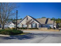 Attractive stone and shingle exterior of a single-Gathering home with a two-car garage at 160 Stonegate Blvd. # 160, Murrells Inlet, SC 29576