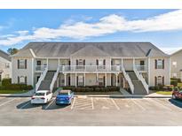 Two-story building with multiple units and ample parking at 209 Wando River Rd. # 10C, Myrtle Beach, SC 29579