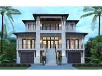 Stunning exterior view of a luxurious three-story home with balconies, complemented by lush tropical landscaping at 4702 N Ocean Blvd., Myrtle Beach, SC 29577
