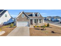 Attractive Craftsman style home with stone accents and a 2-car garage at 5000 Azul Loop, Myrtle Beach, SC 29579