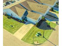 Aerial view of a single story home with manicured lawn and landscaping at 736 Salerno Circle # F, Myrtle Beach, SC 29579
