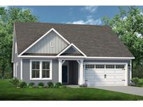 Gray Craftsman style home with two-car garage and landscaped lawn at 508 Sheepbridge Way, Loris, SC 29569