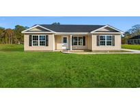 Exterior view of single Gathering home showcasing lawn, landscaping and design at 621 Bay St., Aynor, SC 29511