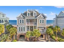Three-story beach home with ocean views and multiple balconies at 1187 Norris Dr., Pawleys Island, SC 29585