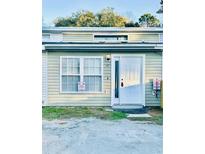 Inviting front entrance with a white door, number 15 and a window at 15 Century St. # 15, Myrtle Beach, SC 29577