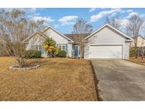One-story house with attached garage and manicured lawn at 3914 Glenmere Dr., Myrtle Beach, SC 29588