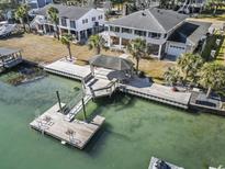 Waterfront property with private dock and gazebo; large home with detached garage at 3545 Marion Ln., Murrells Inlet, SC 29576
