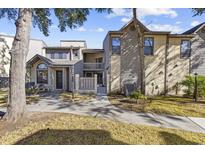 Attractive exterior of a two-story townhome with landscaping and walkway at 611 S 13Th Ave. # 175, Surfside Beach, SC 29575