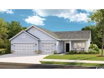 House exterior featuring a 3-car garage and light blue siding at 718 Isle Verde Dr, Myrtle Beach, SC 29579