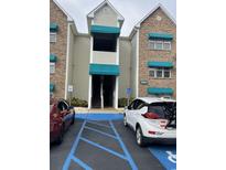 Exterior view of building with parking and access at 9764 Leyland Dr. # 7, Myrtle Beach, SC 29572
