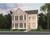 Two-story house with light beige siding, gray shutters, and a front porch at 1757 Tryon Dr, Myrtle Beach, SC 29588
