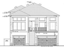 Two-story house with stucco finish, attached garage, and balcony at 429 Harbour View Dr., Myrtle Beach, SC 29579