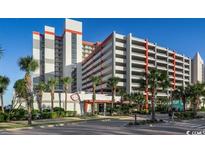 Oceanfront building with parking and palm trees at 7200 N Ocean Blvd. # 1460, Myrtle Beach, SC 29577