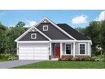 Charming single-Gathering home with gray siding, a red door, and a well-manicured lawn at 1208 Nw Calabash Station Blvd., Calabash, NC 28467