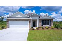 Two-story house with stone accents and a two-car garage at 504 Slaty Dr., Myrtle Beach, SC 29588