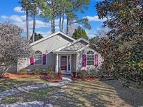 Charming one-story home with landscaped yard and walkway at 1107 Ganton Way, Myrtle Beach, SC 29588