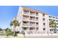 Attractive three-story building with balconies and ocean views at 2710 S Ocean Blvd. # 207 A, Myrtle Beach, SC 29577