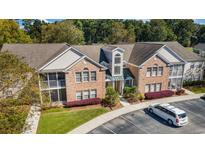 Brick condos with manicured landscaping, and ample parking in a beautiful neighborhood at 4440 Lady Banks Ln. # 10H, Murrells Inlet, SC 29576