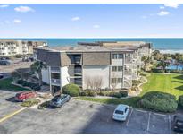 Oceanfront condo building with parking and ocean views at 5601 North Ocean Blvd. # B-312, Myrtle Beach, SC 29577