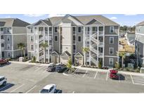 Exterior of a three-story apartment building with parking at 149 Ella Kinley Circle # 302, Myrtle Beach, SC 29588