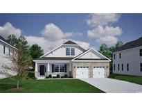 Charming two-story home with stone accents, a two-car garage, and a well-manicured lawn at 336 Happy Valley Dr., Myrtle Beach, SC 29588