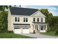 Two-story house with light beige siding, two-car garage, and a front porch at 6723 Genesis Dr, Murrells Inlet, SC 29576