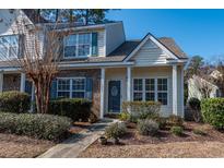 Charming townhouse with well-maintained landscaping and inviting front entrance at 1061 Pinwheel Loop # 1061, Myrtle Beach, SC 29577