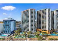 Stunning aerial view of resort buildings, pools, and beautiful landscaping at 2700 N Ocean Blvd. # 253, Myrtle Beach, SC 29577