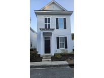 Charming two-story home featuring a dark front door, black shutters, and well-maintained landscaping at 3491 Alexandria Ave., Myrtle Beach, SC 29577