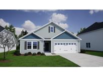 Charming single-Gathering home with blue accents, a two-car garage, and a well-maintained lawn at 914 Agostino Dr., Myrtle Beach, SC 29579